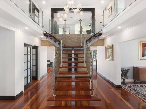 Stunning waterfront home for sale below replacement