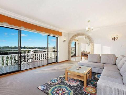 A private ROOM in a huge beautiful furnished three bedroom unit