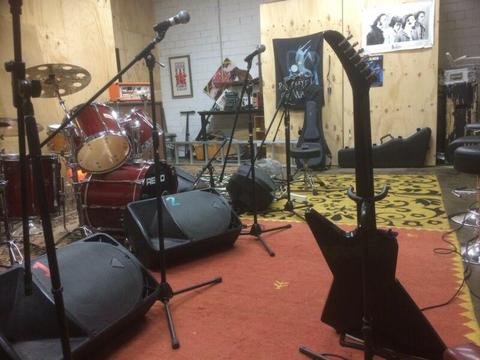 wanted. rehearsal space for rock band