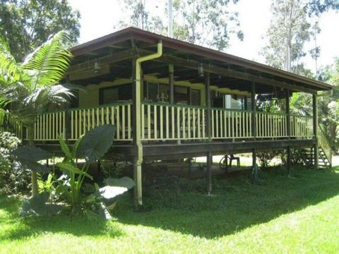 Two bedroom Queenslander on acreage with creek frontage & shed