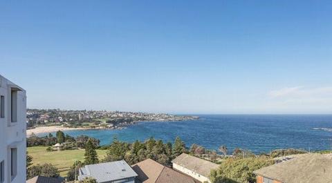 Master bedroom with ocean view in Coogee