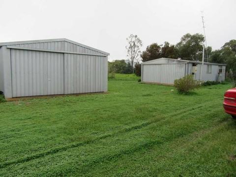 LAND WITH SHEDS FOR LEASE