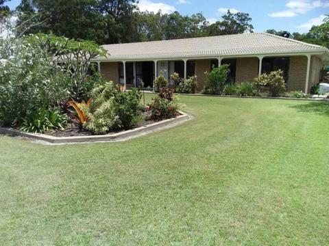 Large move-in ready green home on acreage