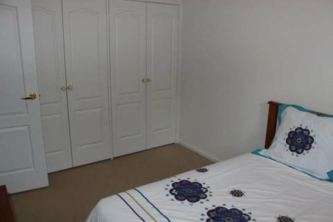 Large, furnished room ideal for couple or small family