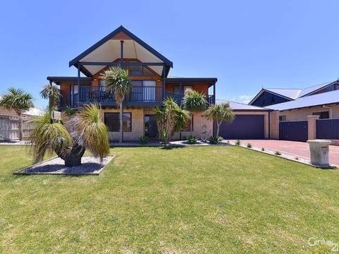 5 bedroom two bathroom double storey home near to the beach