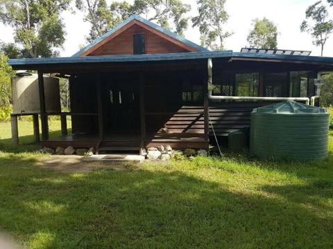 Acreage with cottage on Byfield National Park
