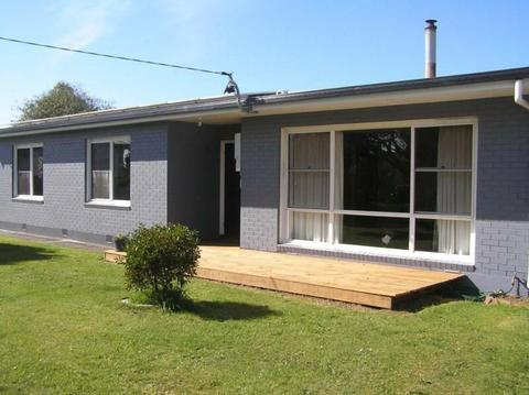 GREAT VALUE Large brick home on double block with sheds