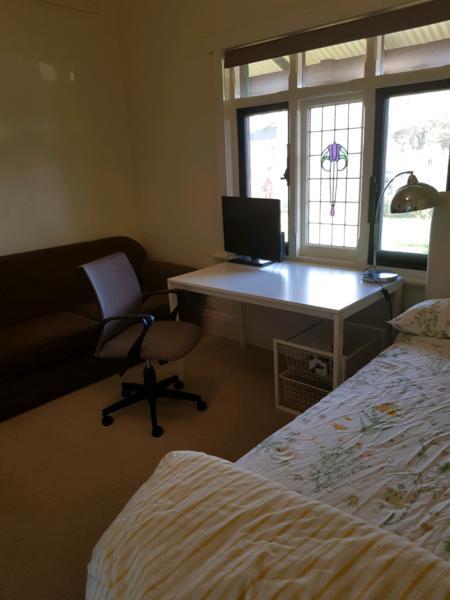 Spacious furnished room for rent, pet friendly, close to train