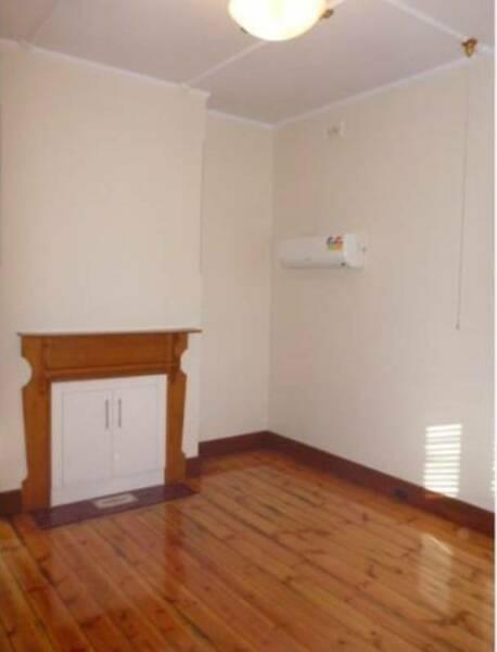 Large Room for Rent in Sharehouse. 4.8 x 5 metres. AC