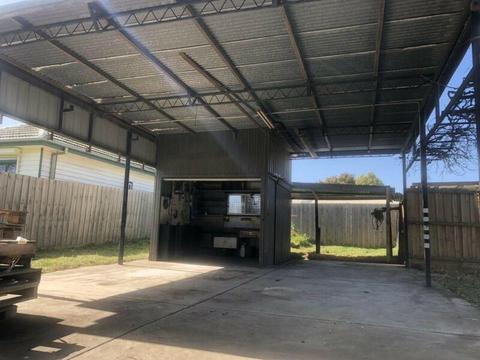 Half Block with Huge carport and lock up shed for rent