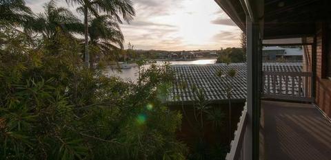 Perfect place for a sundowner - canal front unit with private beach