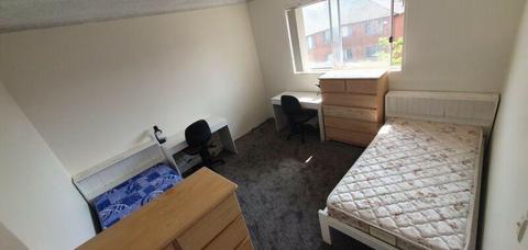 Shared Room 2x Single beds, desks, and chest of drawers. 2x bathrooms