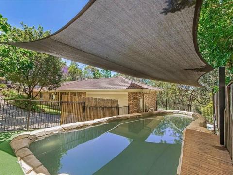 Brick and tile home for sale - 4 bedrooms, pool, large covered deck