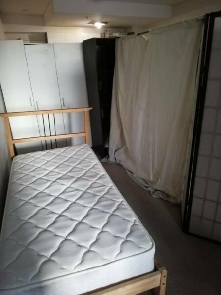 Cheap room divided from living area, 5 minutes walk to station