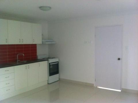 modern one bedroom one livng room with a kitchenette granny flat