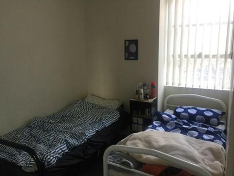Need a guy in 2single beds room (339Swanston st)